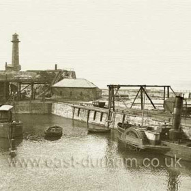 Dock workhorse, "Grappler" at left, tug "Seaham" at right c 1930.