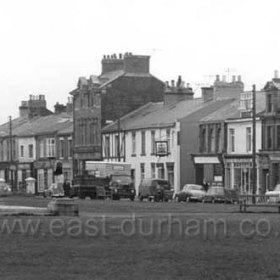 South end of North Tce in 1960, Frank Valente's ice cream shop at right.