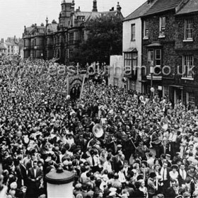 Banners entering Durham City at Durham Miners Gala (Durham Big Meeting) in the 1950s.