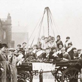 Labour party float, probably 1930s election, at the junction of Tempest Rd and North Terrace, the old infirmary in background.