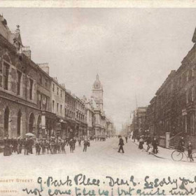 Dated 8th April 1903 Addressed to :-
Miss Mclndew
c/o Miss Hall
19 Church Hill
Leamington. 

A very early postcard where there is only provision for the address on the back of the card
In my experience this is quite a rare card showing on the right the frontage of the Athenaeum, built in 1839-41 to house the Literary and Philosophical Society. The Gothic building on the left corner housed the offices of the Gas Company from 1867.