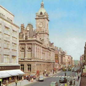 Fawcett Street in the 1960s.
In those sixty years Binns had taken over all of the shops between the Gas Office and the Town Hall; had lost all their shops on both sides of Fawcett Street thanks to Hitler's bombs; and had completely rebuilt with the most modern of departmental stores. Telephone boxes have appeared plus a 'zebra' crossing. Electric tramcars have been and gone and buses are now operating in a 'one-way' system.