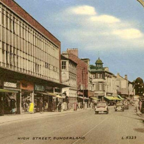 Now Spot the Difference. Same street, same position but the card is dated 15th August 1966, fifty years on. On the left are shops which were rebuilt following bomb damage during the Second World War. Marks and Spencer are just to the right and below the tower, centre. The shop immediately behind the lamp post and to the right was Marshalls the drapers with its wonderful track system for the transfer of cash from the counter to the cashier's office and vice-versa .
Tramlines are still in evidence but the overhead wires have gone. The photograph was probably taken about 1955, tramcars having ceased to run in 1954.