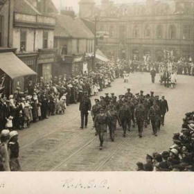 Possibly part of the Victory Peace Procession following the First World War.   A reprint of a postcard in 'The People's History'-'Something for you from Sunderland' by Stuart Miller, on close examination reveals the same crowd of people watching a different part of the procession. In the background is the Londonderry Hotel, formerly the Peacock until 1831 and a meeting place for Free Masons.