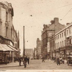 An undated postcard but probably about 30 years on. Taken from Mackies Corner with the new bridge in the background. Immediately behind the first car is the 'Maypole' and Emersons the opticians. Further down is The Grand Hotel and beyond that the Sunderland Echo Office.