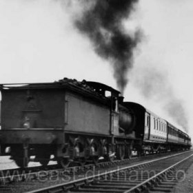 Two engines struggle up the steep incline at Seaton.