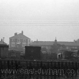 Looking east from Strangford Road to the Station and Station Hotel