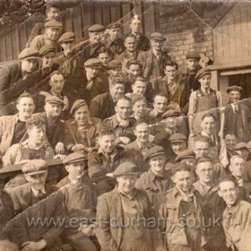 J L THOMSON JOINERS 1945
About half of the joiners employed at Thompson's sitting on a stack of timber during the dinner break outside the joiners shop. Photograph and info Alf Redford