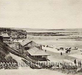 Sands and Holey Rock, Roker c 1910
On the left the path runs from the cliff top road (out of picture)  down to the  road leading towards Holey Rock and the entrance to Roker Park The wide promenade along the road has stone balustrading with access to the sands and the tide is very far out uncovering the rock pools which gave great pleasure to children  This area was the heart of Victorian Roker with many fine buildings including the Roker hotel on the cliff top road overlooking the beach.
Information from Len Charlton.