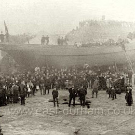 'Linthorpe' only iron ship to be built in Seaham. launched  18/10/1884 for Middlesbro owners.
A 133 ton iron screw ketch she, ended her working life as a river schooner in West Africa. 
The roof of the old lifeboat house can be seen just left of centre at the base of lighthouse cliff.
Linthorpe must have been built on the broad base of the old north pier near the top of the slope.