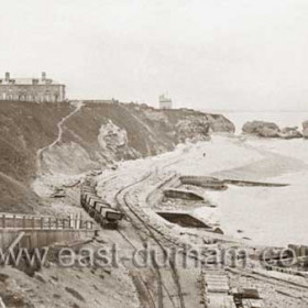 1899, at this stage sand and gravel were being taken off the Terrace Beach only (for manufacture of concrete blocks for new piers etc). Later the beach railway would be extended past the Featherbed Rock onto the North Beach.