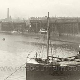 Looking south across the South Dock to the staithes (built 1905 and 1925). Photograph c1930. Collier Matching 1,321grt, built 1924 at Monkwearmouth, broken up at Dunston in 1955.See South Dock panorama for a larger version of this photograph.