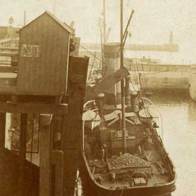 Detail from previous picture, collier loading coal at north wall of South Dock c 1910.