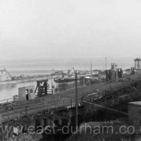 Looking across the staithes to the South Dock. Photographed from the balcony of the Time Office in Aug 1964.
Photograph from Bryan Snowball