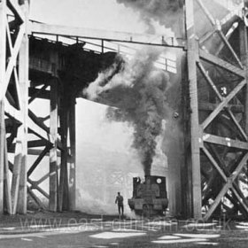 Superb photograph of Loco 18 under the staithes in the 1960's 
Photographer unknown