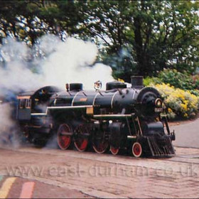 This little train has been carrying children around the lake in the park at South Shields for over thirty years. No visit is complete without riding behind the engine and enjoying the unique smell of smoke and steam and hot oil. Dads can be found at the station persuading their offspring to come for a ride on it every summer.
Photograph (2009) and caption from Malcolm Fraser