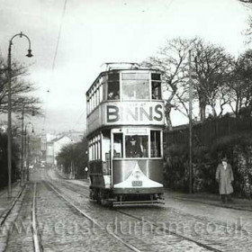 Tram 22 is nearing the top of the bank in Burdon Road on one of its last trips to Grangetown. It is Sunday 30th November 1952 and the route will be abandoned tonight after tram 74 brings the last passengers down this bank on its way to the Wheat Sheaf depot. Trams have been running up and down here for fifty-two years and number 22 has been in use all that time. It started off as a single-deck car, bought for the Villette Road route, and was re-created in 1925 to become the tram we see here. It will run for another year before being burned on the block yard between the piers at Roker. None of the Corporation buses will last anywhere near as long.    
Caption from Malcolm Fraser