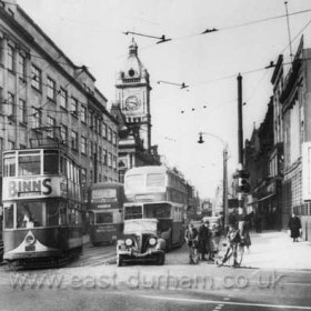 Fawcett Street 1954
This photo is one of a pair dating from April 1954 and was taken a few minutes after SdT 003. Tram 90 has just reversed outside the Museum in Borough Road and is setting off for the Blue Bell at the top of Dene Lane at Fulwell, a short-working of the one remaining route to Seaburn via Fulwell . In the background, one of its sister cars is completing its journey from the Dykelands Road terminus at Seaburn. Both trams will become redundant within six months, along with all the rest, when the tram system is finally abandoned in favour of buses on Friday 1st October.    
Caption from Malcolm Fraser