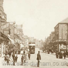 It is 1903 and we are standing in High Street West, on the corner of Gill Bridge Avenue, looking east towards Mackies Corner. Tram 39 is passing Castle Street on its way to the Circle terminus at the north end of the Central Station. The tramway here was originally operated by horse trams but it was electrified in February 1901. Number 39 was delivered at the same time, so both the tram and the track are a couple of years old. On the left, Kennedy’s shop in the Cobden Exchange building will be destroyed in a disastrous fire in 1904 but will be rebuilt to survive until the 1980’s.    Info from Malcolm Fraser