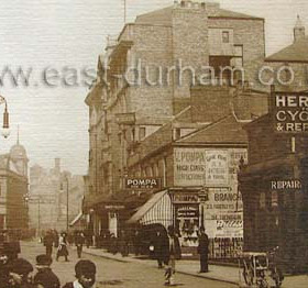 Crowtree Road c 1900.
Crowtree Road runs from the top of Holmeside to High St West and with Fawcett St across the bottom a half-mile square of  shopping streets is formed.  In the late 1800s these four shopping streets surrounded a maze of narrow residential streets of small cottages many of which survived until the 1930s. though by then mixed up with markets and small shops. The four original surrounding streets survive and now enclose The Bridges shopping centre.as well as part of the old High St West now pedestrianised.
Information from Len Charlton. 
Norman Kirtlan