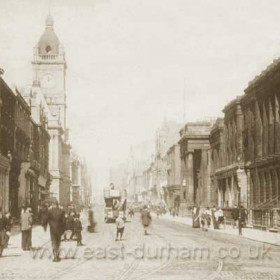 This is Fawcett Street in the 1890’s. The town hall, on the left, was built in 1890 and still looks new. The columns of the Athenaeum Building on the right were removed in 1900 and replaced by the shops which can be seen in photo SDTC 022. A horse tram is seen heading north towards the river. The horse tram system operated here from 1879 until 1900, when the new electric trams took over.   Info from Malcolm Fraser