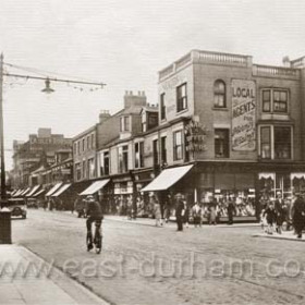 Looking up Holmeside towards Park Lane in the 1920s. In the foreground the road is crossing the railway lines which run behind Fawcett St. The wall on the right conceals the cutting in which the lines ran to the central station. After the war this cutting as well the station platforms were covered over by shops to make an underground complex. Holmeside competed with Fawcett St for high quality shopping and Saxons on the corner was prewar the main toyshop in Sunderland.
Information from Len Charlton.