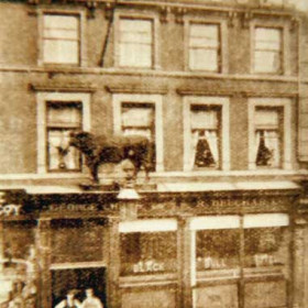 The Black Bull 309 High St West survived  wholesale clearances  of the area for redevelopment in the 1950s. The facade remains much the same but the magnificent bull and lamp have gone.      Photograph N Kirtlan, caption Len Charlton.