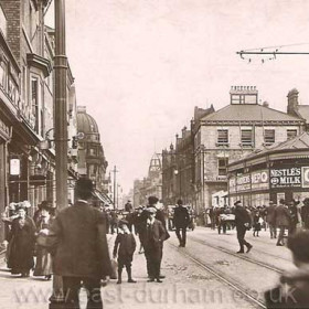 High Street, Blackett's and north end of Railway Station at right. c1920?