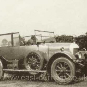 Jack Balls, a teacher at Byron Tce School driving a Bull-Nosed Morris.    Photograph from Godfrey Little