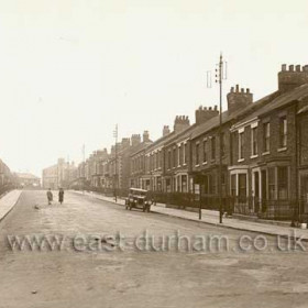 Marlborough St built 1856-70, Station Hotel and Railway Station at top of street. Railings removed during WW11, Photo  late 1920's