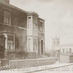 Looking past the western side of Sophia St to St John's Church c 1930