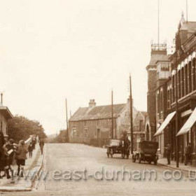 Looking west up Castlereagh Rd past the Co-op and Drill Hall to the ancient Dene House Farm. Photo c 1930