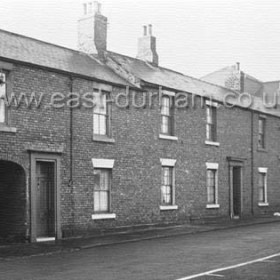 Hunters Buildings, entrance to yard at left, looking towards Theatre Royal in the  1950s. demolished c1960.