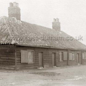 Old wooden houses first called Wood Cottages then Marquess Cottages, Wood Houses and finally Pilot Cottages   These buildings were the first houses erected in Seaham Harbour ( before 1828 ) on what is now the Terrace Green to house workers building the dock, later moved to the Pilot Tce site ( at the NE corner of the Bottleworks area )  they were demolished in 1934.