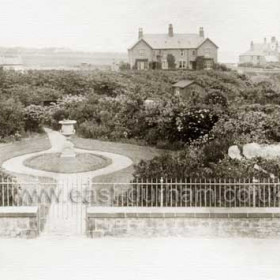 Rear of North Rd houses at right, Brookside Villas centre and theToll Cottage at left on the north side of the dene, built 1834, the Toll Cottage became a private dwelling after the bridge was demolished in 1855. the cottage was demolished in the 1930's. Photograph c 1900.