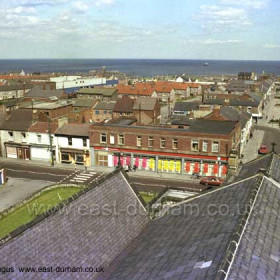 View from St John's church tower in 1981.  Blandford Place at centre, the Arcade  already closed, by this time an indoor market which itself closed a few years ago. Church St at right.