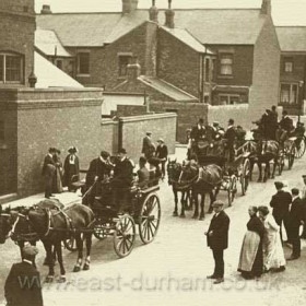 Carriages in Charles Street, Emily St School to left, Londonderry Yard to right. Occasion not known. Photograph c1910?