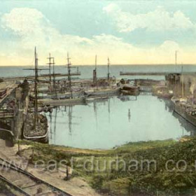 A great shot of the busy, gated North Dock showing colliers, wagons and coal drops at both north and south walls around 1905.